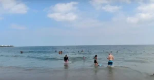 Swimming on beach